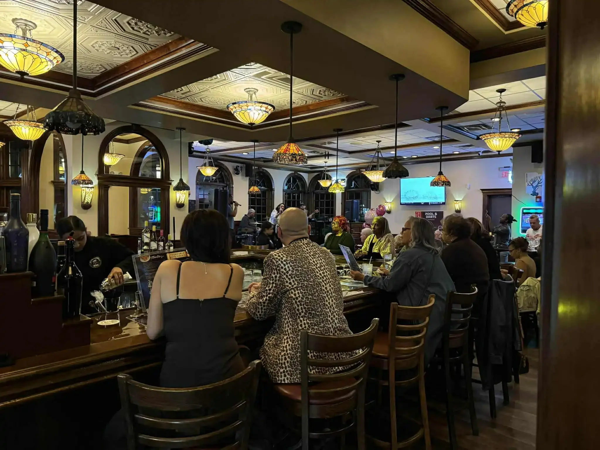 Guests at the bar on a busy evening